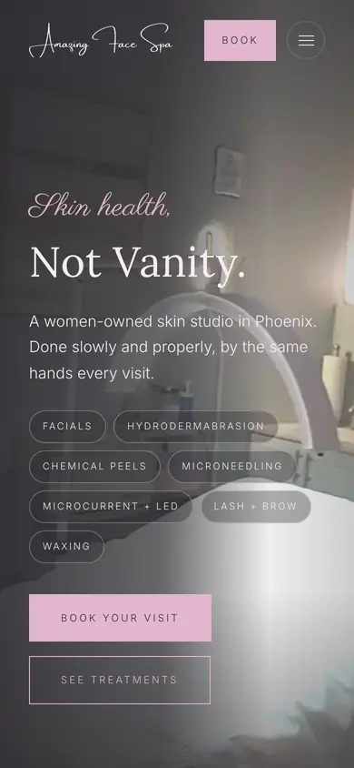The Amazing Face Spa site on a phone