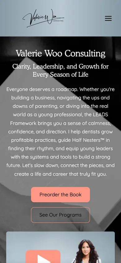 The Valerie Woo Consulting site on a phone